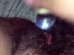 Masturbating with a dildo and squirting all over the glass