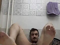 Horny gay teen's self-pleasure session with condom