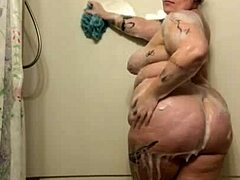Cute and chubby girl gets a massage and jerks off in the shower