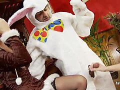 Two busty babes get wild with the Easter bunny in a raunchy threesome