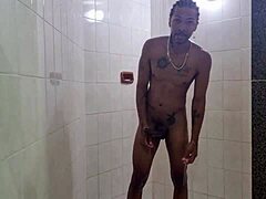 A black cock and a white pussy get wet in the shower
