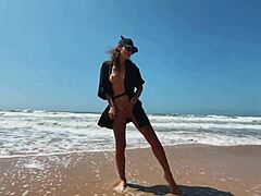 A captivating POV blowjob from a beautiful young girl in a hat at a secluded nude beach, featuring foot fetish and sex toys