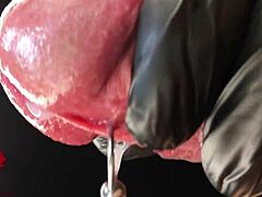 Intense POV of latex-clad amateur indulging in peehole play and satisfying climax